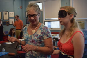 Two women participating in a volunteer training for guiding